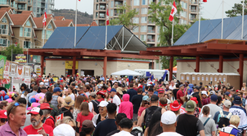 PHOTOS: Massive crowds brave the rain to celebrate Canada Day downtown